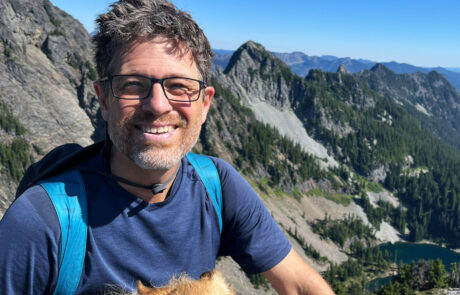 Howard Lamb of Sunergy Systems hiking in the Cascade Mountains with his dog, promoting clean energy and outdoor adventure. Howard Lamb of Sunergy Systems hiking in the Cascade Mountains with his dog, promoting clean energy and outdoor adventure.