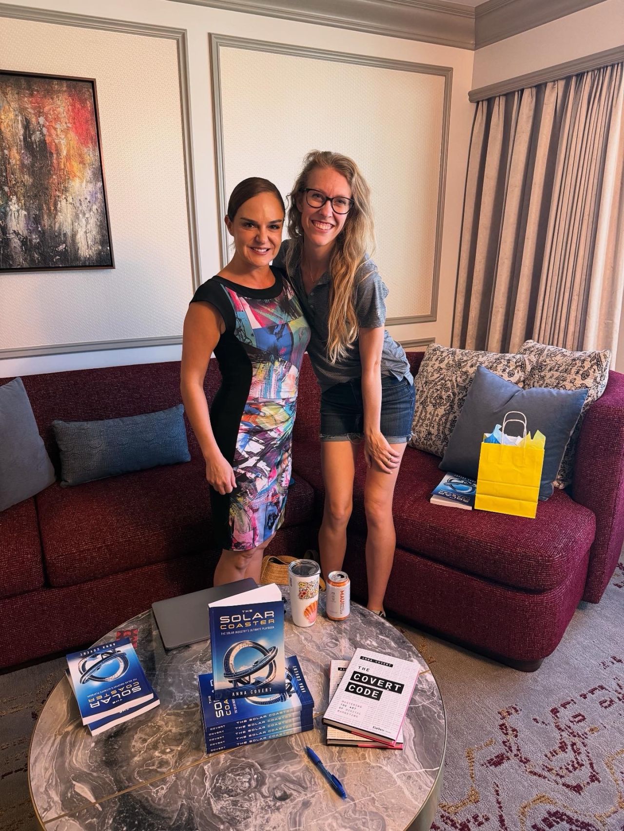 Anna Covert with Hannah Raines at RE+ Las Vegas, featuring The Solar Coaster and The Covert Code books