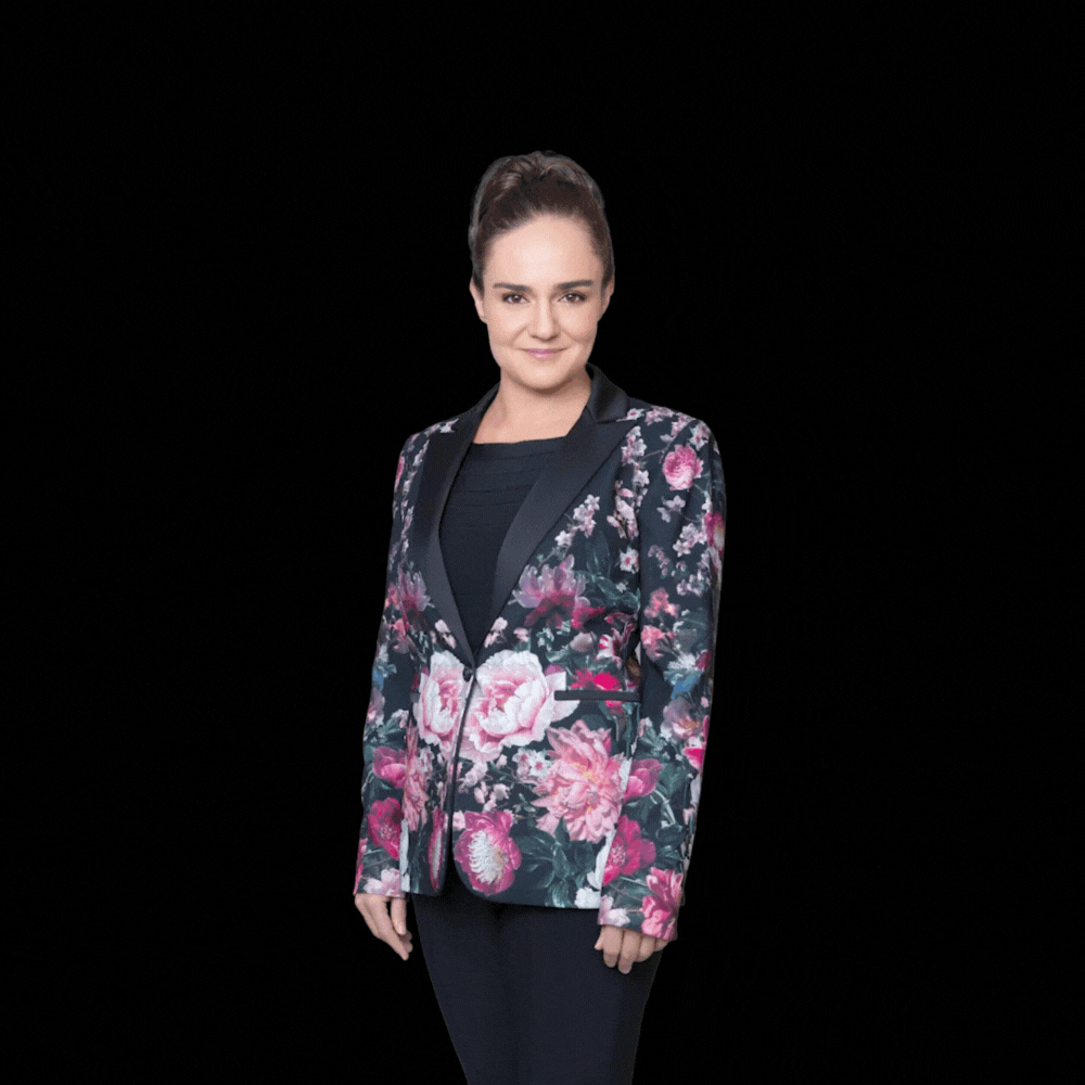 Anna Covert, author of The Solar Coaster: The Solar Industry’s Ultimate Playbook, wearing a floral blazer against a smoky gray backdrop for book promotion. Anna Covert, author of The Solar Coaster: The Solar Industry’s Ultimate Playbook, wearing a floral blazer against a smoky gray backdrop for book promotion.
